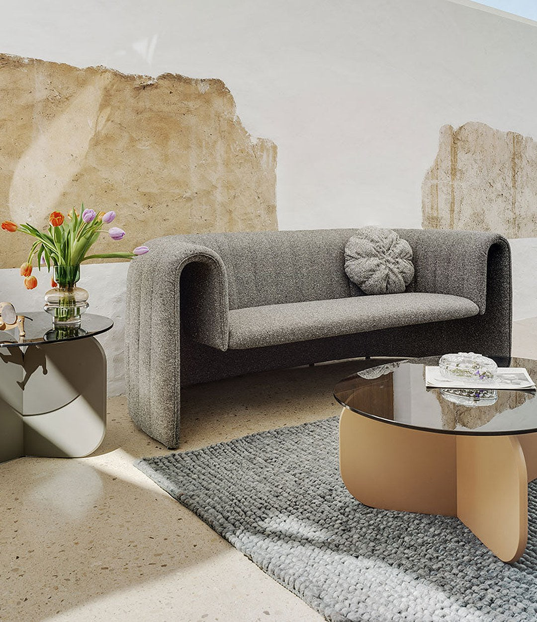 Remnant Sofa by Sancal in grey with a glass coffee table – In Dubai by WSPR
