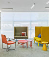 Rew Sofa by Sancal in green and yellow in an office lounge, wide view – In Dubai by WSPR
