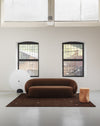 Rificolona 120 Floor Lamp by Miniforms styled in a living room with a curved brown sofa and rug – In Dubai by WSPR