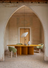 Rificolona Pendant by Miniforms styled in an arched doorway above a round table – In Dubai by WSPR