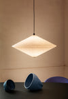 Rificolona Pendant by Miniforms, tilted shade over a dark table – In Dubai by WSPR