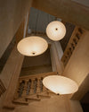Rificolona Pendant by Miniforms, three shades seen from a stairwell – In Dubai by WSPR