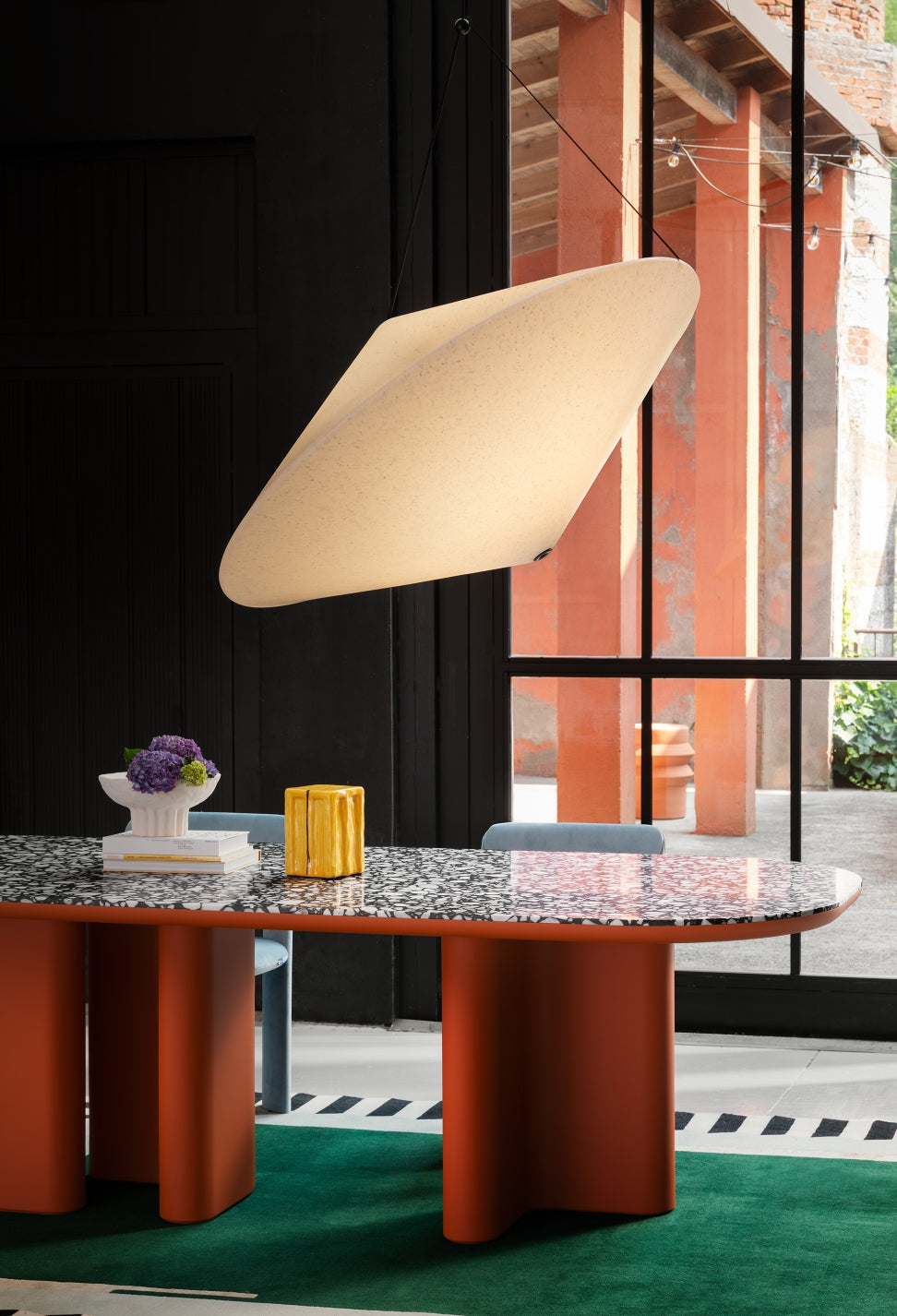 Rificolona Pendant by Miniforms styled above a terrazzo table with a window view – In Dubai by WSPR