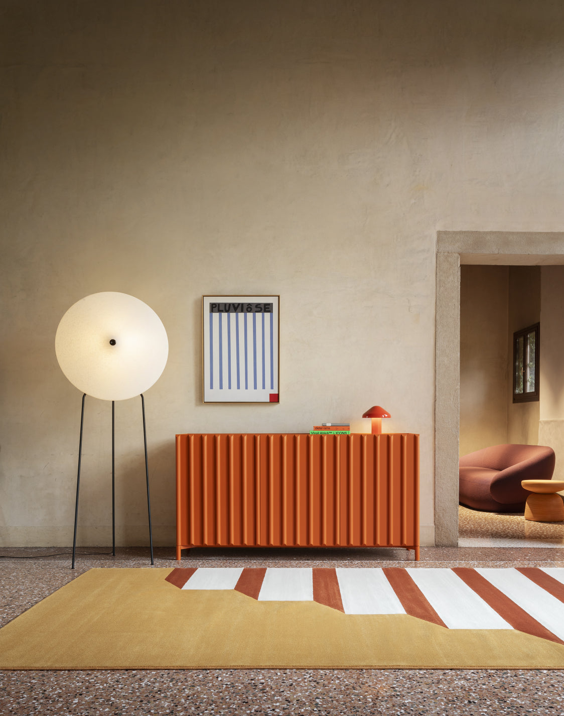 Rificolona Floor Lamp by Miniforms styled in a warm room with an orange sideboard – In Dubai by WSPR