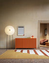 Rificolona Floor Lamp by Miniforms styled in a warm room with an orange sideboard – In Dubai by WSPR