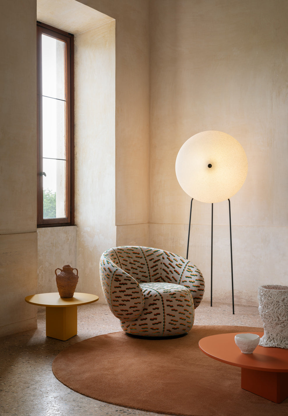 Rificolona Floor Lamp by Miniforms styled in a villa room beside a patterned armchair – In Dubai by WSPR
