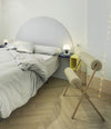 Roll Chair by Sancal in cream by a bed – In Dubai by WSPR
