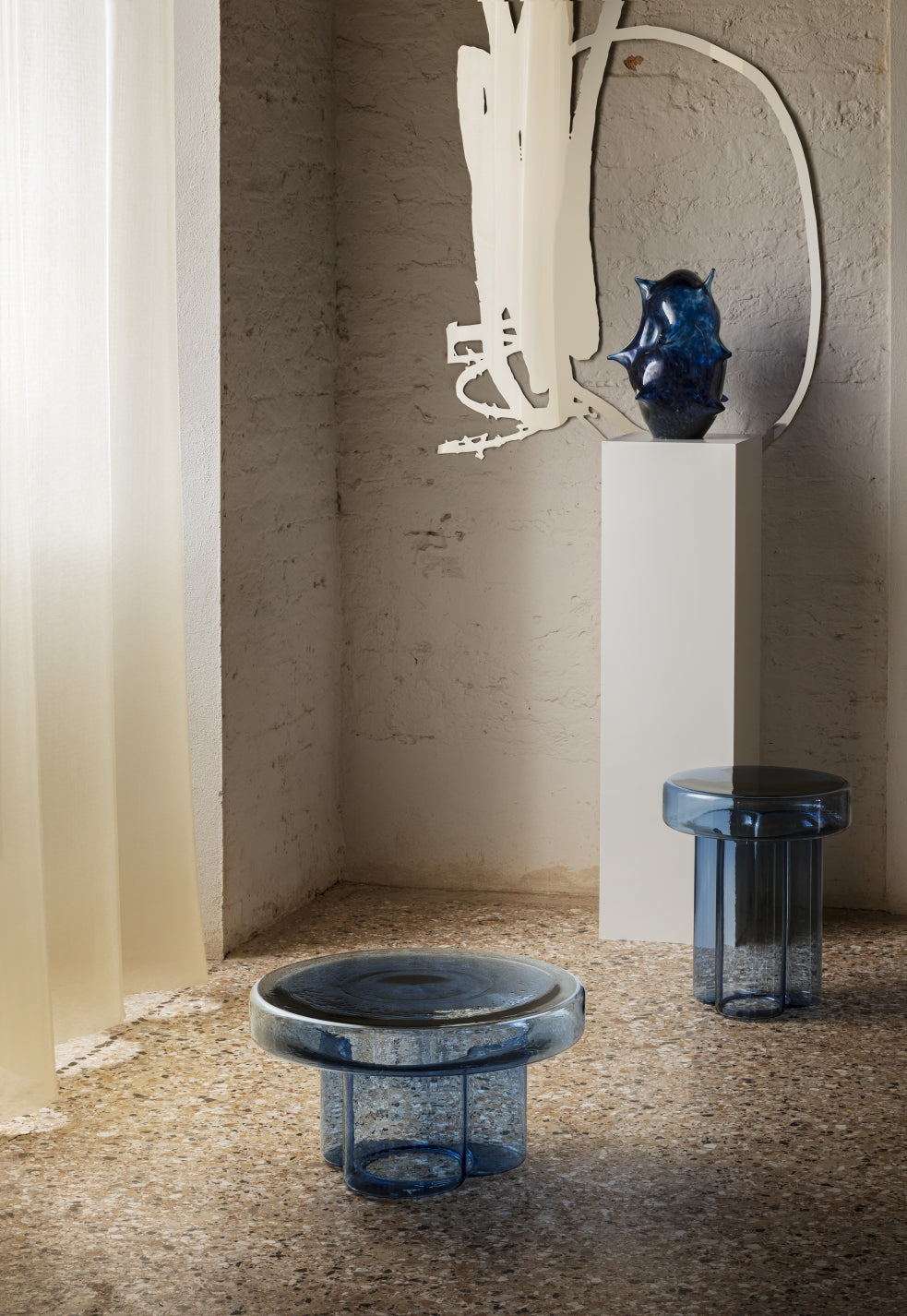 Soda Coffee Table by Miniforms styled in blue blown glass in a calm studio corner – In Dubai by WSPR