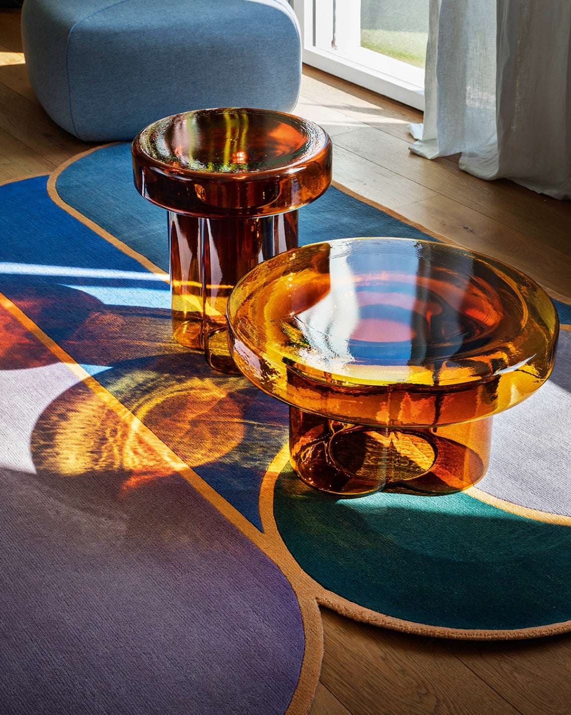 Soda Coffee Table by Miniforms styled in amber blown glass on a patterned rug – In Dubai by WSPR