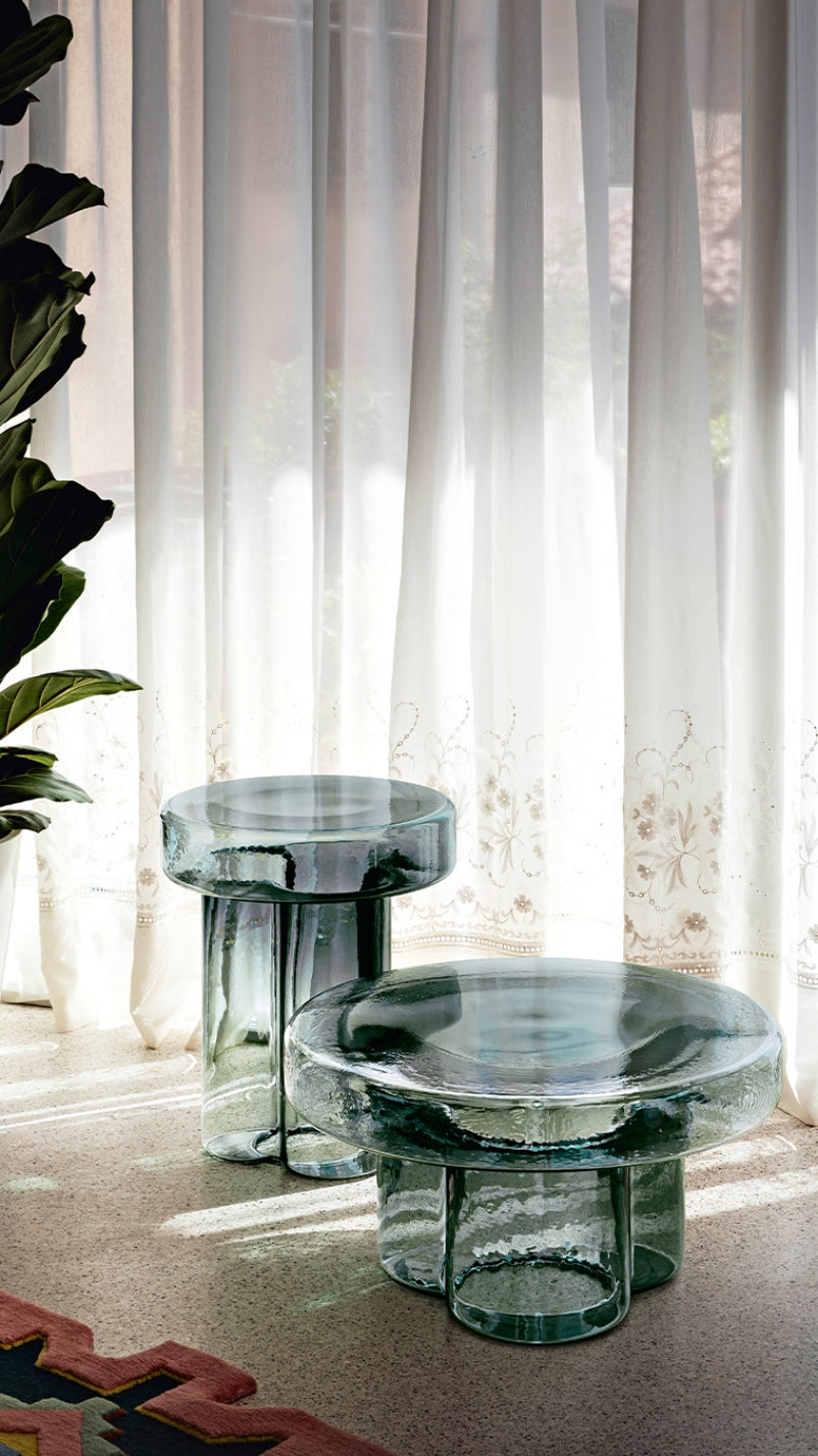 Soda Coffee Table by Miniforms styled in green blown glass in a bright room with sheer curtains – In Dubai by WSPR