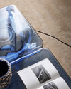 Soda SQ Coffee Table by Miniforms, close-up of blue blown glass with an open book – In Dubai by WSPR