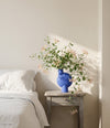 Sphere Vase Bubl, Medio by 101 Copenhagen in Marrakech Blue in a styled interior – In Dubai by WSPR