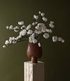 Sphere Vase Square, Big by 101 Copenhagen in Terracotta in a styled interior, view 2 – In Dubai by WSPR