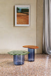Striche Coffee Table by Miniforms styled in a neutral room with a framed picture and curtain – In Dubai by WSPR