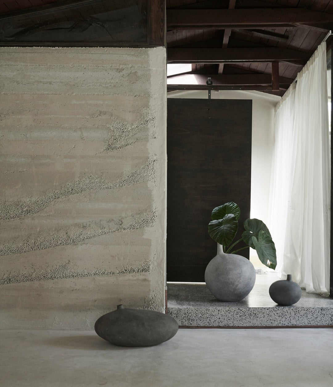 Submarine Vase, Small by 101 Copenhagen in Dark Grey in a styled interior, view 2 – In Dubai by WSPR