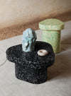 Superpop Coffee Table by Miniforms styled as a side table with sculptural objects on a concrete floor – In Dubai by WSPR
