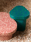 Superpop Coffee Table by Miniforms styled in red and green speckled polyethylene on a terrazzo floor, close view – In Dubai by WSPR