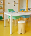 Tab Stool by Sancal with a white top by a white table – In Dubai by WSPR