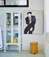 Tab Stool by Sancal in a hallway by a glass cabinet – In Dubai by WSPR