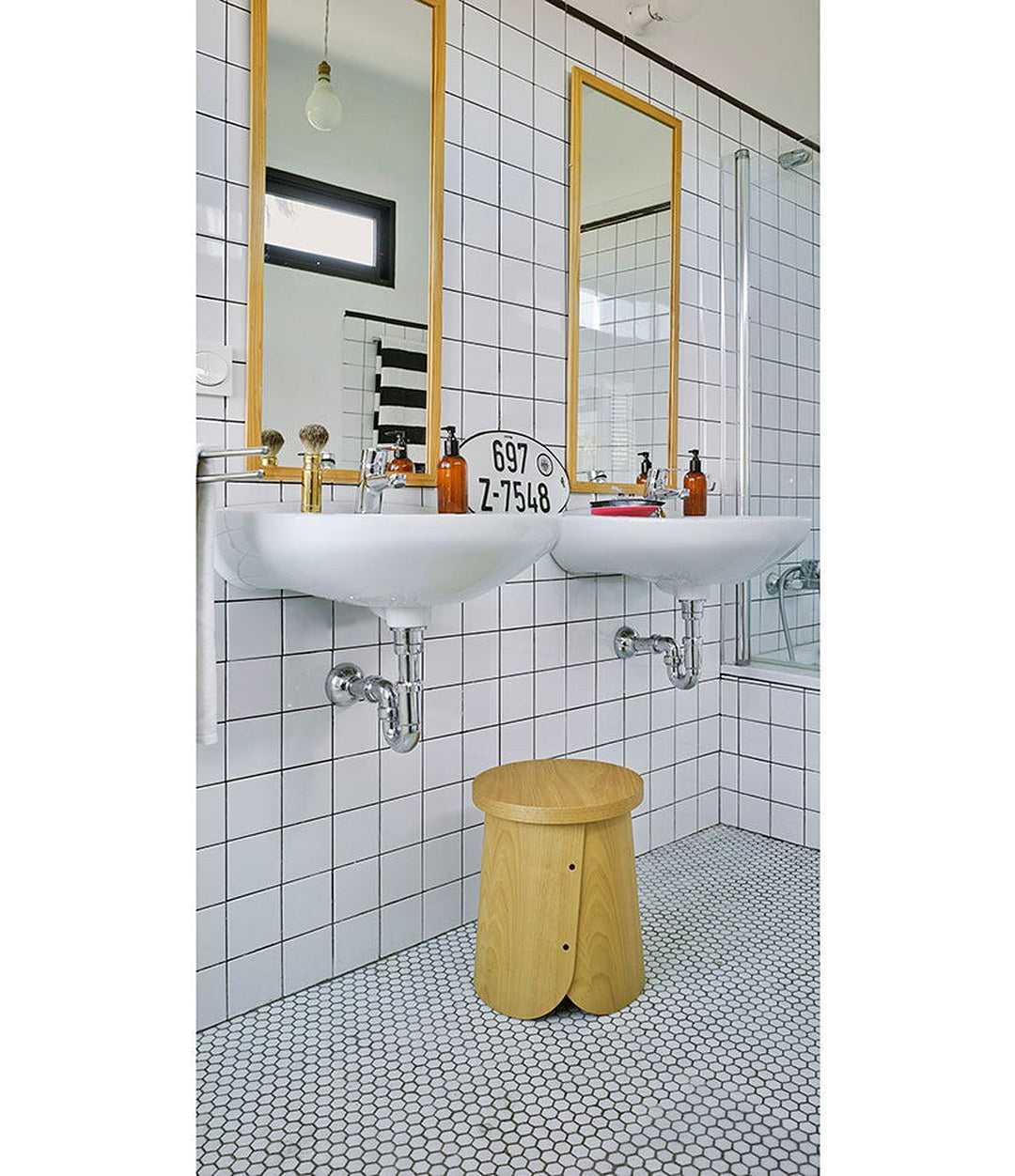 Tab Stool by Sancal in a tiled bathroom – In Dubai by WSPR