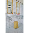 Tab Stool by Sancal in a tiled bathroom – In Dubai by WSPR