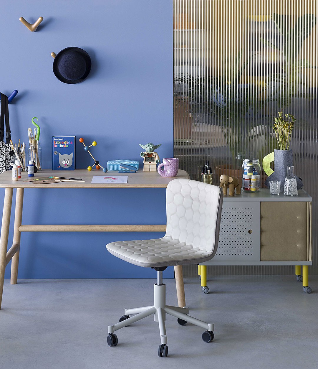 Tea Chair by Sancal swivel chair in white at a desk – In Dubai by WSPR