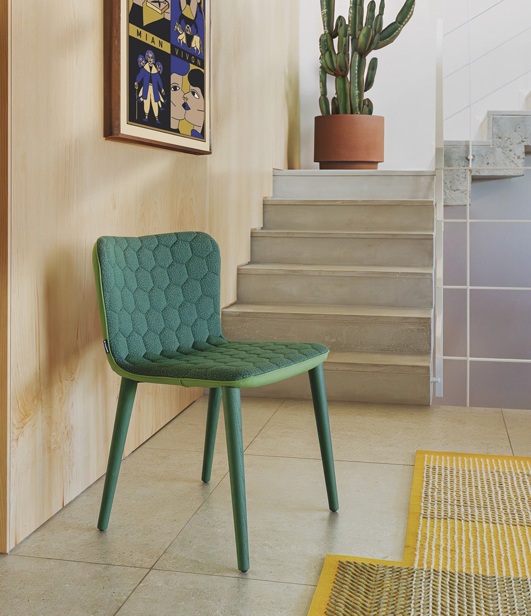 Tea Chair by Sancal in green by a staircase – In Dubai by WSPR
