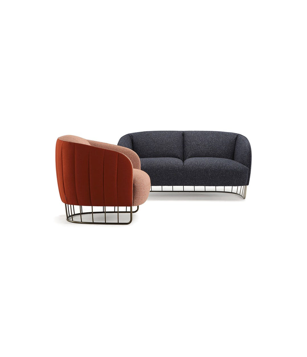 Tonella Armchair by Sancal in rust beside a charcoal sofa – In Dubai by WSPR