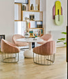 Tonella Lounge Chair by Sancal in pink around a dining table – In Dubai by WSPR