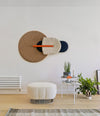 Tonella Pouf by Sancal in cream by a wall sculpture – In Dubai by WSPR