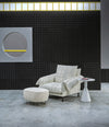 Tonella Pouf by Sancal in cream beside an armchair – In Dubai by WSPR