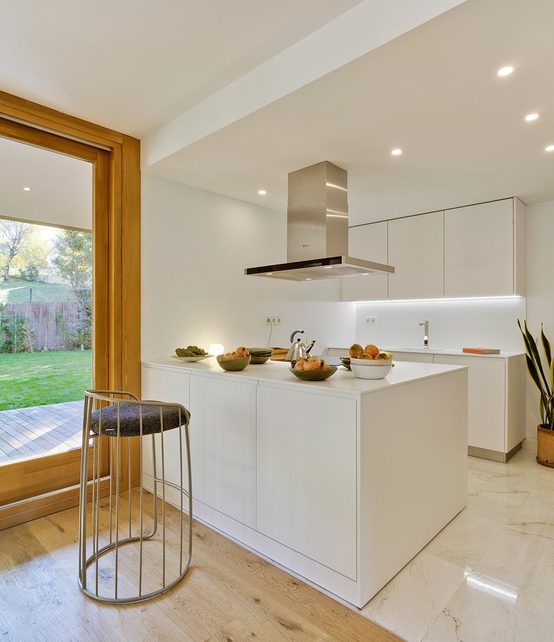 Tonella Stool by Sancal at a white kitchen island – In Dubai by WSPR