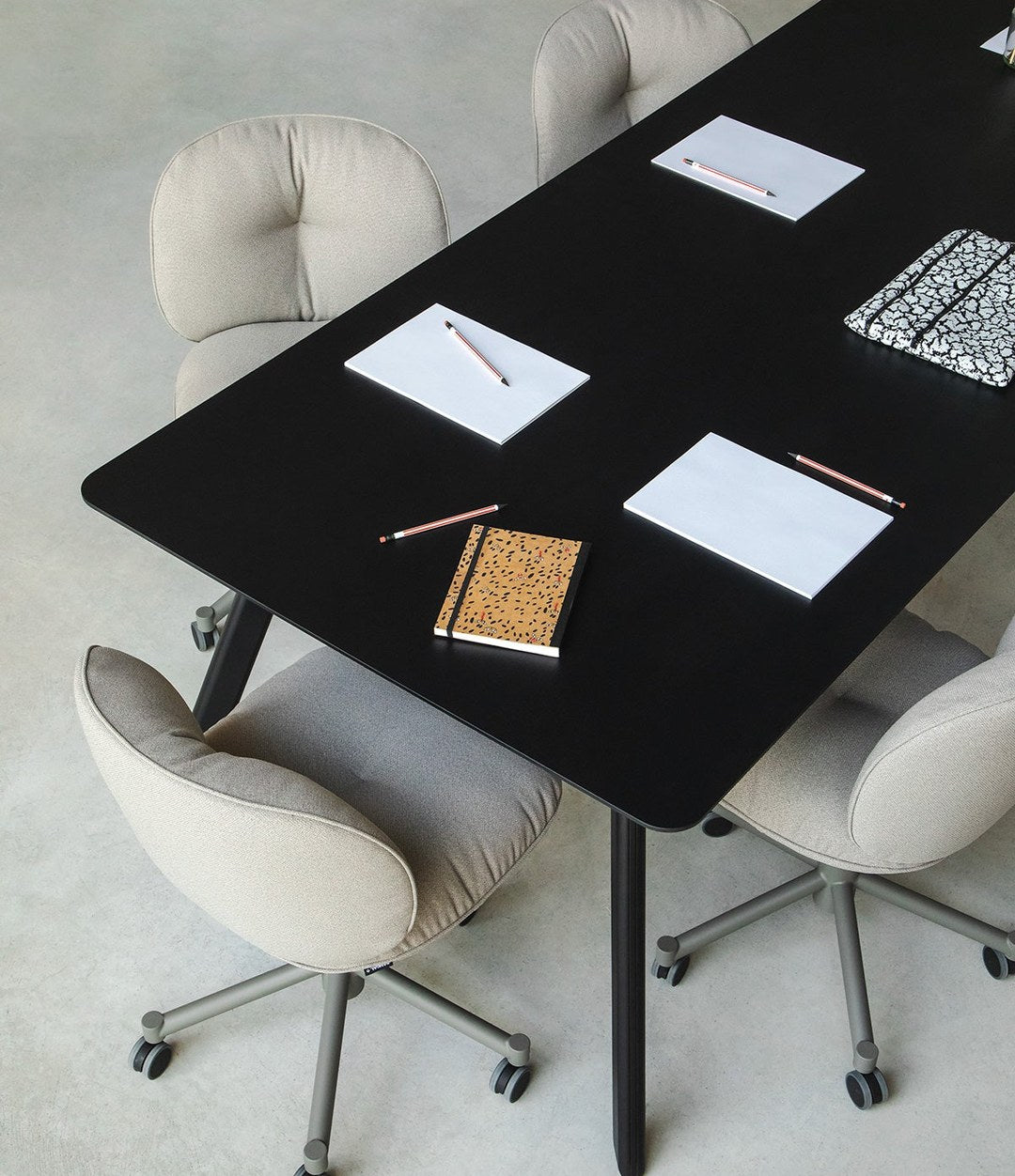 Tortuga Dining Table by Sancal in black, detail with office chairs – In Dubai by WSPR