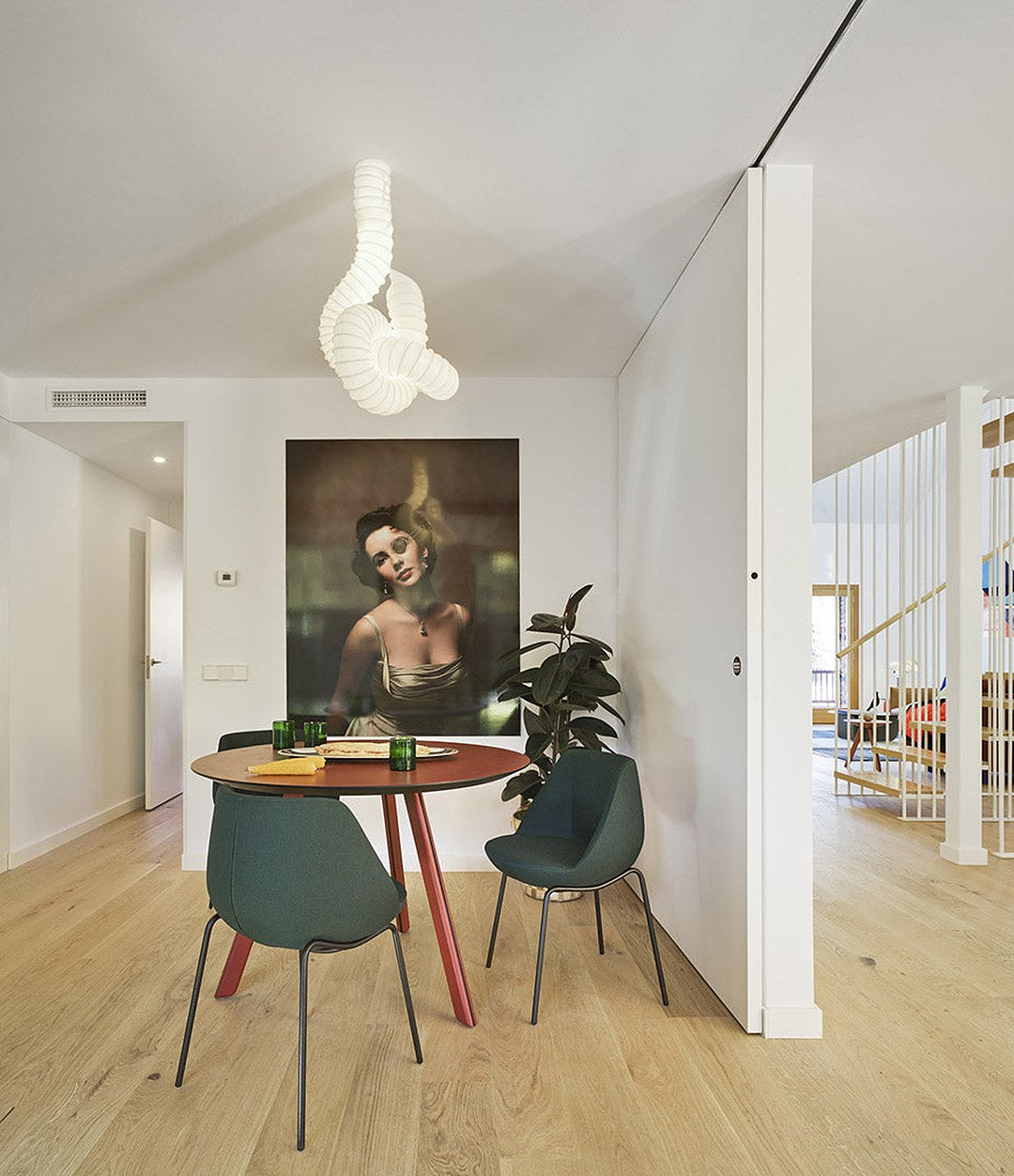 Tortuga Dining Table by Sancal round in red with green chairs – In Dubai by WSPR