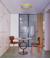 Totem Dining Table by Sancal in brown with orange chairs – In Dubai by WSPR