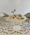 Totem Dining Table by Sancal in white with patterned armchairs – In Dubai by WSPR