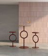 Totem Dining Table by Sancal bar tables in rust against pink tiles – In Dubai by WSPR
