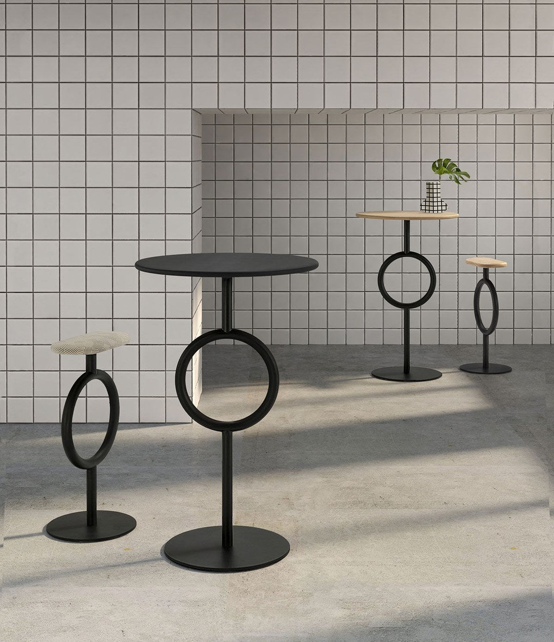 Totem Dining Table by Sancal bar tables in black against white tiles – In Dubai by WSPR