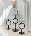 Totem Stool by Sancal in black around a high table – In Dubai by WSPR