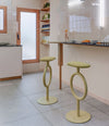 Totem Stool by Sancal in olive at a kitchen counter – In Dubai by WSPR