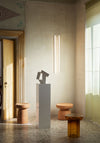 Tototò Coffee Table by Miniforms in natural terracotta, styled in a room beside a plinth and sculpture – In Dubai by WSPR