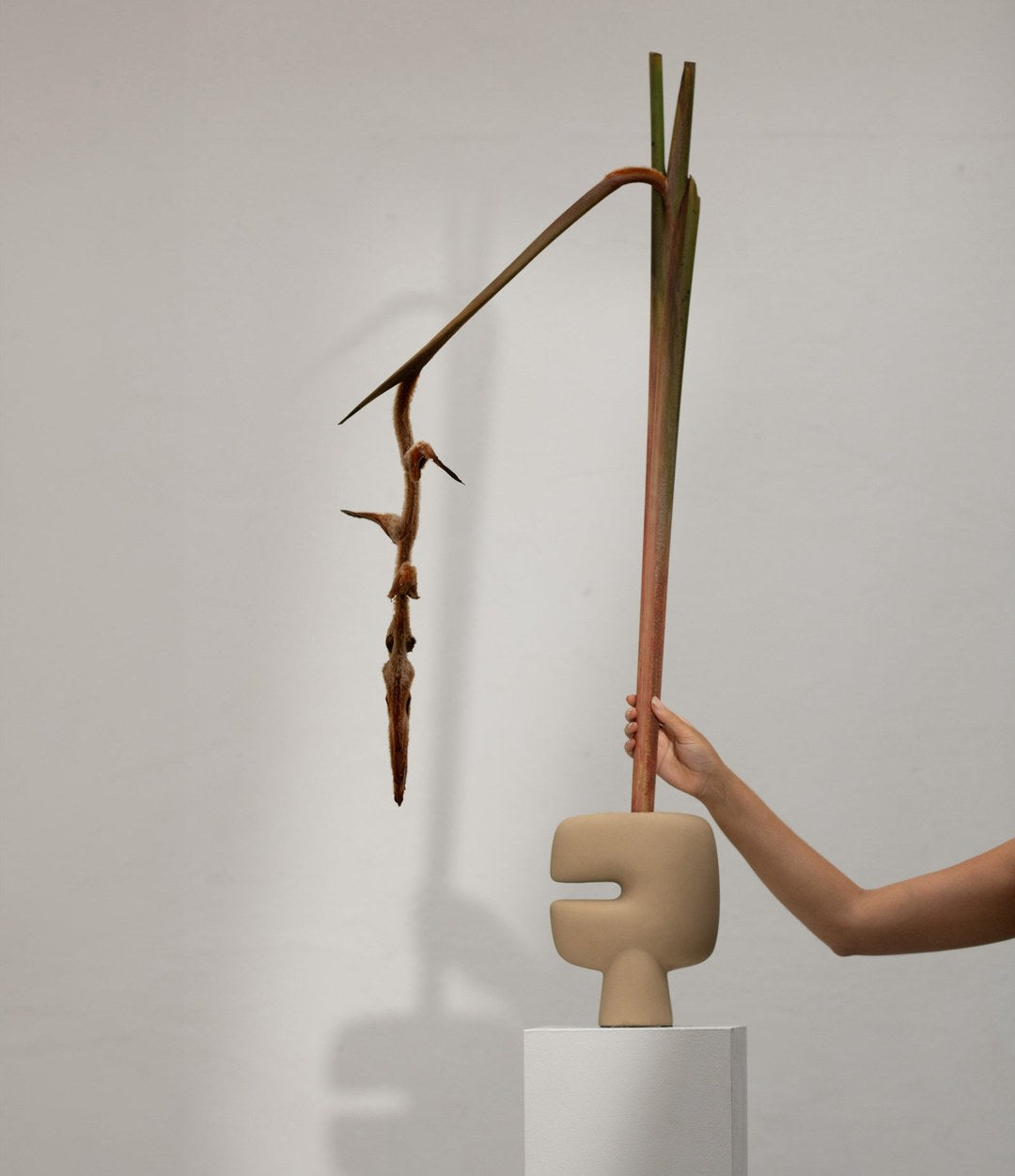 Tribal Vase, Mini by 101 Copenhagen in Sand in a styled interior – In Dubai by WSPR