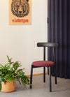 Vavavà Vase by Miniforms styled beside a black chair and a plant – In Dubai by WSPR