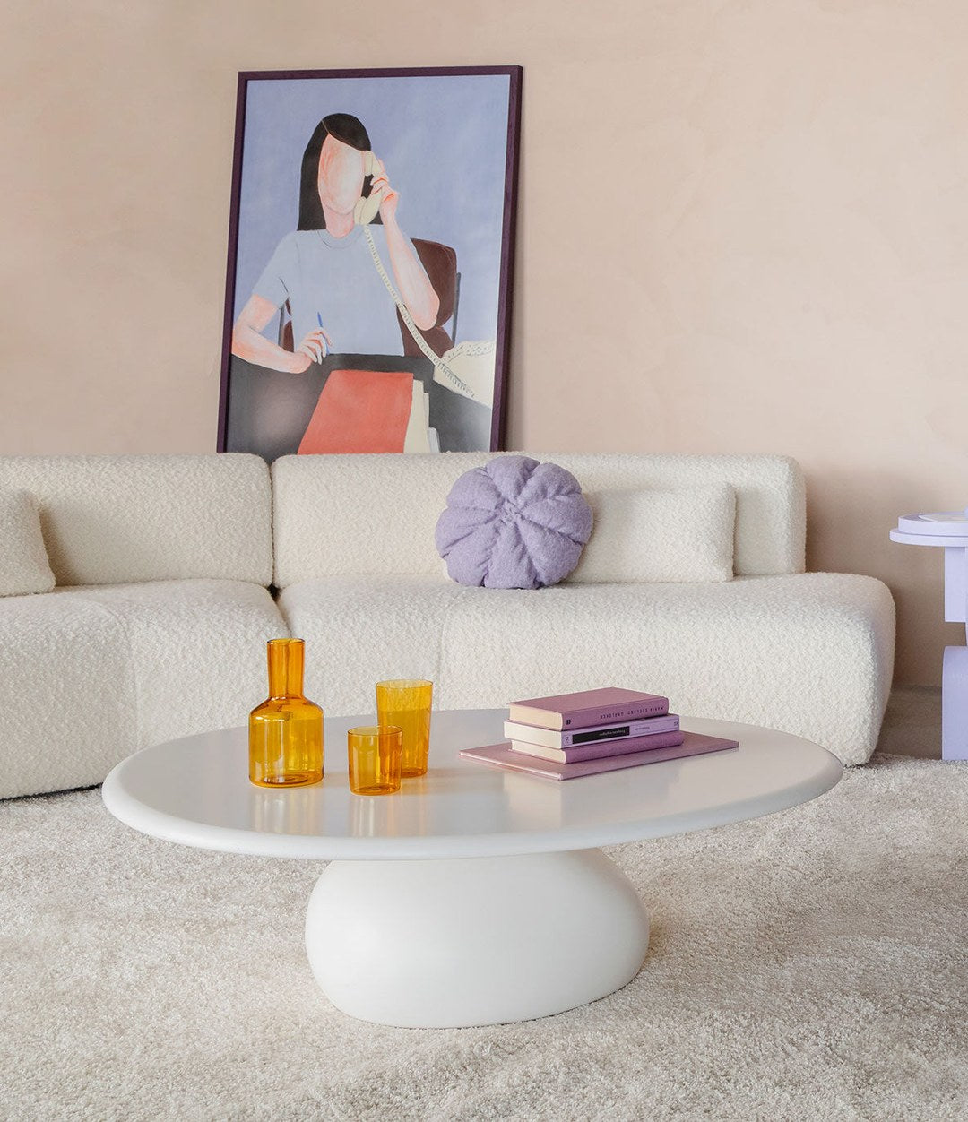 Vesper Coffee Table by Sancal in white beside a cream sofa – In Dubai by WSPR