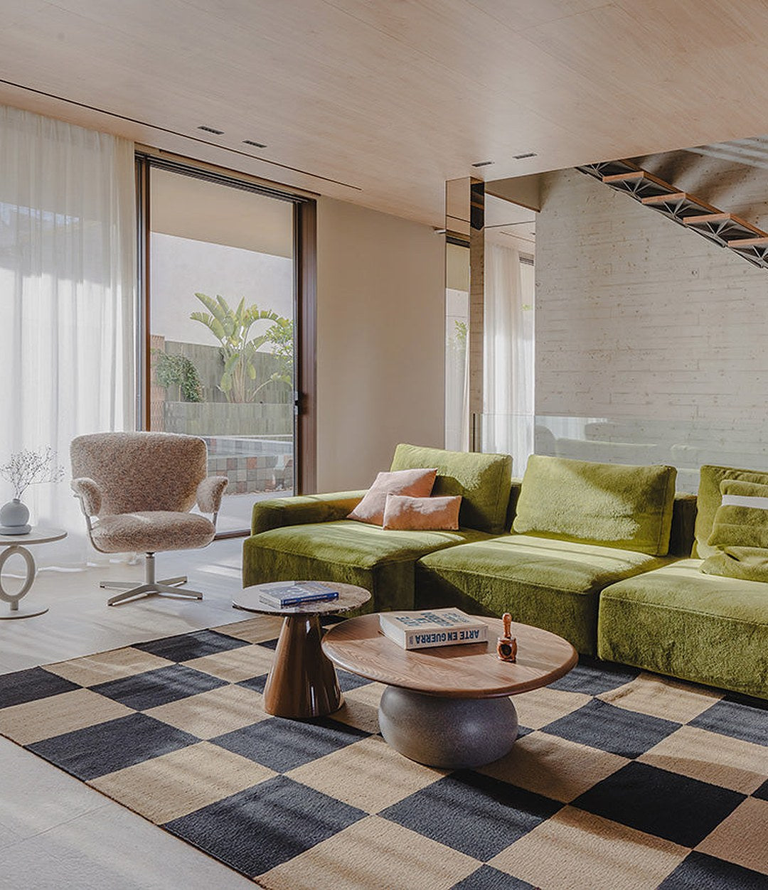 Vesper Coffee Table by Sancal in brown beside a green velvet sofa – In Dubai by WSPR