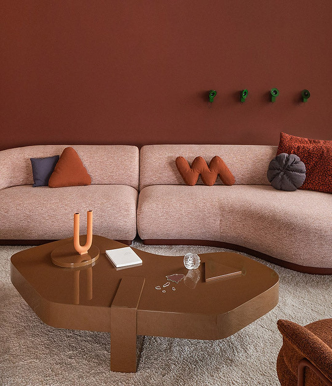 Vesta Modular Sofa by Sancal curved sofa in a red room – In Dubai by WSPR