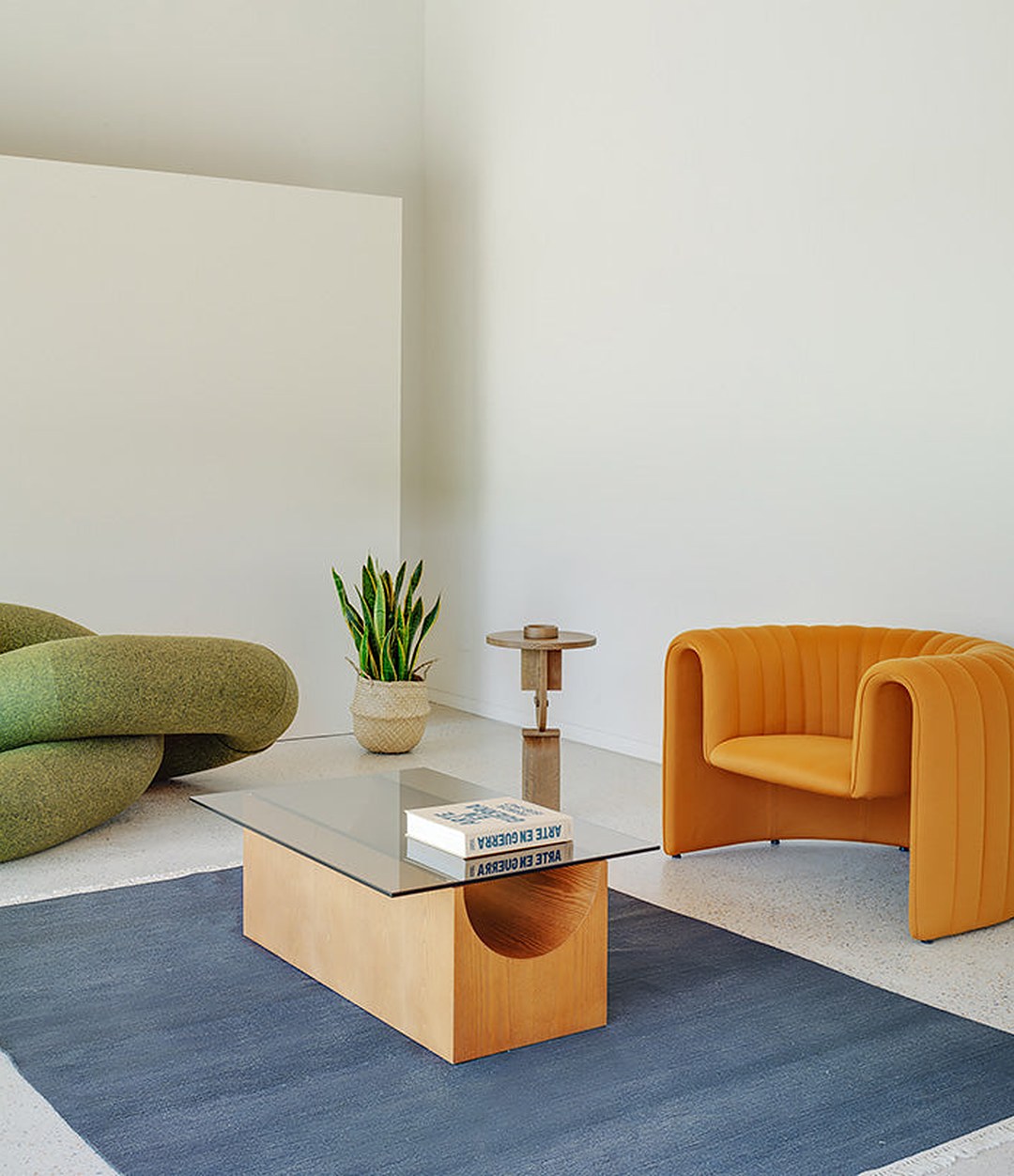 Vestige Coffee Table by Sancal in green with red armchairs – In Dubai by WSPR