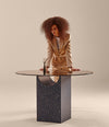 Vestige Dining Table by Sancal round, with a model – In Dubai by WSPR