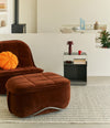 Vibe Pouf by Sancal in brown velvet with a lounge chair – In Dubai by WSPR