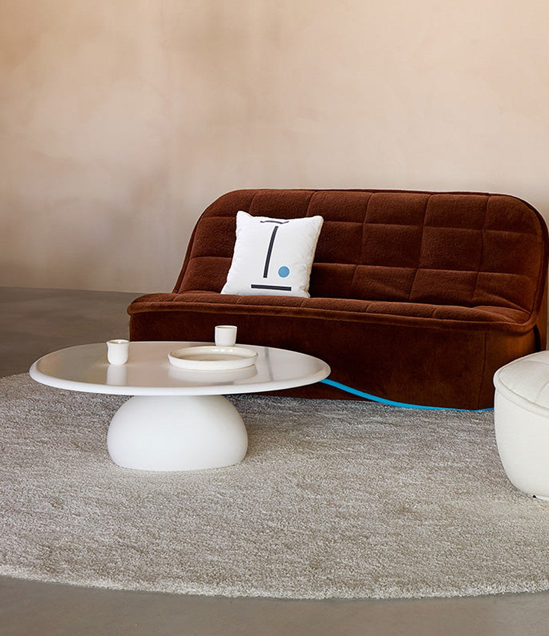 Vibe Sofa by Sancal in brown velvet with a white lounge chair – In Dubai by WSPR